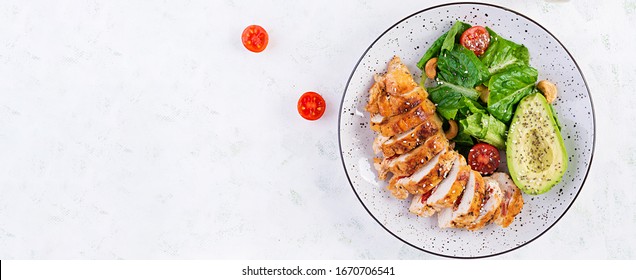 Trendy Salad. Chicken Grilled Fillet With Salad Fresh Tomatoes And Avocado. Healthy Food, Ketogenic Diet, Diet Lunch Concept. Keto/Paleo Diet Menu. Top View, Overhead, Banner