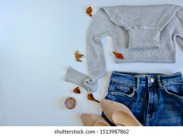 Trendy Set Of Autumnal Female Clothes On White Background. Flay Lay, Top View Composition