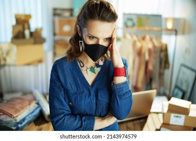 Trendy Small Business Owner Woman With Black Mask In The Office.