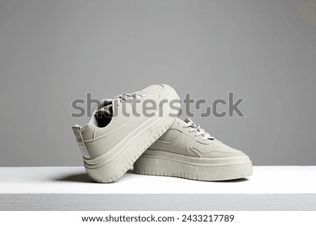 trendy sneakers. fashion shoes still life. gumshoes. stylish photo in the studio.