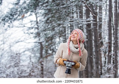 Trendy and stylish. woman hold photo camera. make photo shot of snowy winter nature. cold and beautiful weather. happy hiker girl retro camera. professional photographer winter landscape - Shutterstock ID 2209431871