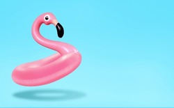 Trendy Summer Composition Made Of Pink Flamingo Inflatable On Bright Light Blue Background.Minimal Summer Concept.Creative Art,Contemporary Style.Banner Background With Writing Space And Copy Space.