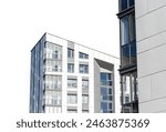 Trendy urban apartment building, highrise flats isolated on white. Modern with window design, new residential complex. High condominium with concrete facade, city housing investment project.