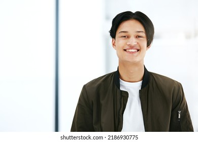 Trendy, Young And Cool Businessman In The Millennial Age Happy To Start His First Day At Work At A Creative Company Or Business With Copy Space Background. Portrait Face Of One Edgy Marketing Intern