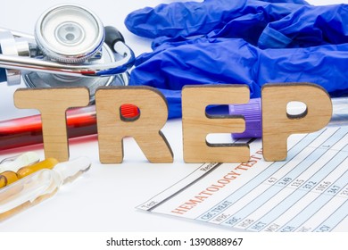 TREP laboratory medical abbreviation treponemal antibodies (syphilis) concept photo. On table is laboratory acronym TREP next to tubes of blood, other biological fluids, result analysis, stethoscope