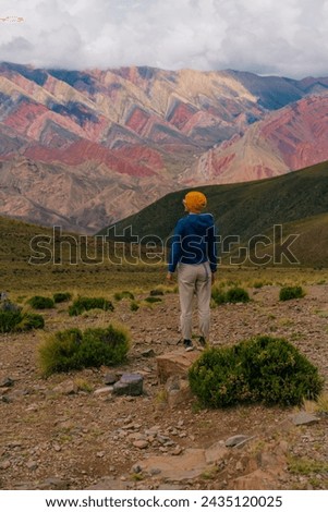 treveler in Cerro de los 14 Colores, or Fourteen Coloured Mountain, Serrania de Hornocal, Jujuy, Argentina. High quality photo