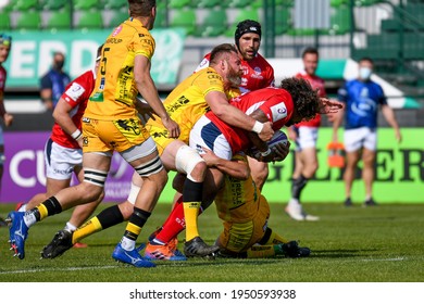 Treviso, Italy, April 03, 2021, Malino Vanai (Agen) Tackled By IrnÃ© Herbst (Benetton Treviso) During Rugby Challenge Cup Benetton Treviso Vs SUA LG Agen