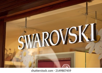 TREVISO, ITALY - APRIL 8, 2022: Close-up of the Swarovski corporate logo above the shop window of a luxury boutique in Treviso downtown. Veneto, Italy, Europe.