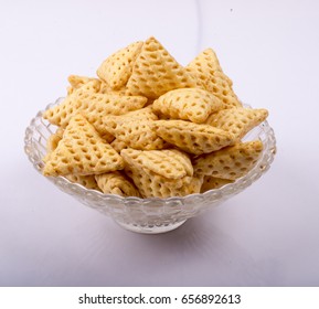 tri angle corn puff snacks or namkeen in bowl image