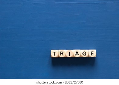 Triage Word On Blue Background