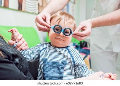 Trial Frame. Glasses Prescription For A Child. Child's Hypermetropy. Child's Shortsightedness. Child's Myopia. 