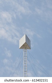  triangle board with high iron structure on building rooftop in sunny day