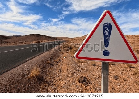 Triangle Danger Road Sign, Exclamation Mark Sign, Danger Sign in the Desert