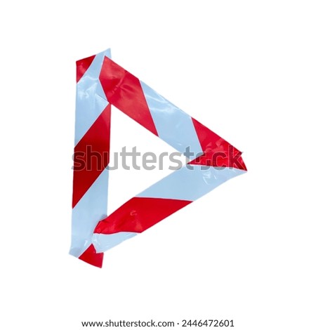 triangle shape made from red and white barricade tape
