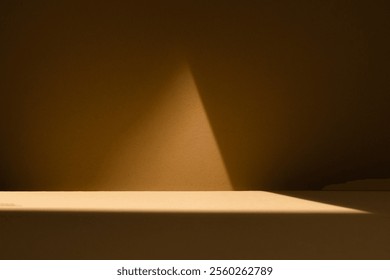 A triangular beam of light creating geometric contrast on a brown background, perfect for abstract concepts and creative designs. Minimalist light background
