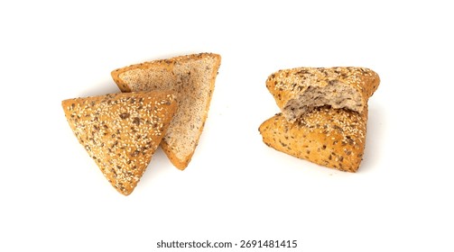 Triangular broken bun isolated. Wheat bread with sesame and flax seeds, healthy whole grain bakery on white background