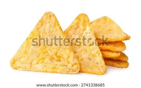 Triangular corn chips close-up on a white background. Isolated