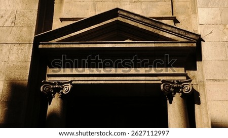 triangular cornice in stately facade