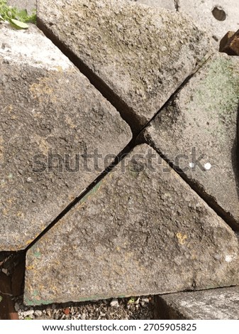 triangular paving blocks arranged in a certain shape