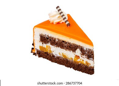 A Triangular Piece Of Cake On A White Background