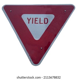 A triangular red and white yield sign close up with with a white background - Powered by Shutterstock - Get 15% off with code: PIKWIZARD15
