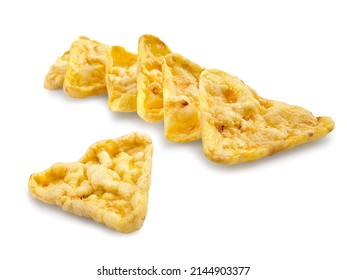 Triangular roasted corn chips on white background
