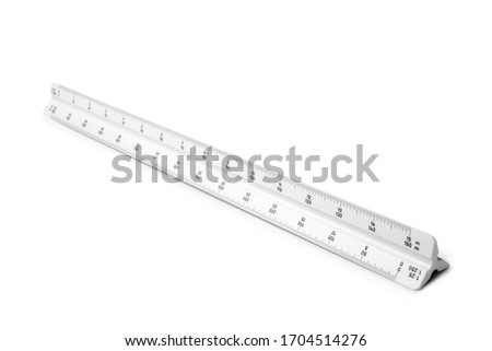 Triangular scale ruler on white background