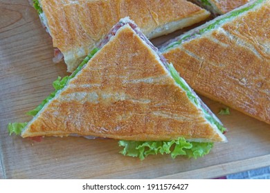 Triangular toast sandwiches diagonally cut fast food - Shutterstock ID 1911576427