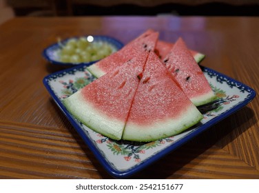 Triangular Watermelon Slices on a Wooden Table - Powered by Shutterstock