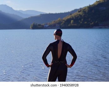 Triathlete Swimmer Portrait Wearing Wetsuit On Training