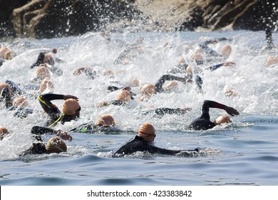 Triathlon Iron Men In Swimming Competition 