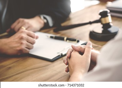 tribunal and justice concept, Consultation with insurance lawyer and customer - Shutterstock ID 714371032