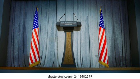 Tribune for politician, congressman or US minister political speech in the White House in press campaign room. Wooden conference debate stand with microphones on stage. American flags in background. - Powered by Shutterstock