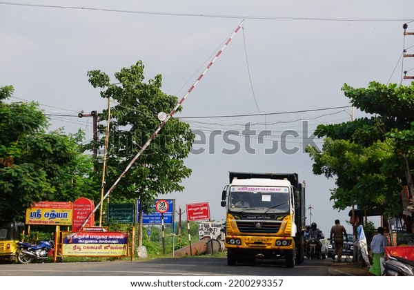 Trichy, Tamilnadu, India- August 19 2022 : Lorry\
crossing kudamurutti police check post No VII situated at Trichy\
kudamurutti bridge 