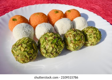 Tricolor Tiranga Sweets Ladoo Or Laddu For Indian Republic Day And Independence Day , Served In Ceramic Plate. Close Up Of Indian Flag Three Colours Food Celebration