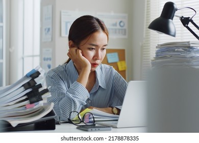 Tried Asian Office Employee Feeling Bored, Unhappy And Burnout Working In Office