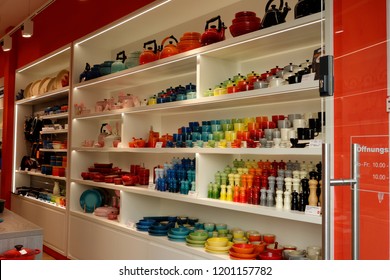 Trier, Germany - October 12, 2018: Le Creuset Is A Premium French Cookware Manufacturer Best Known For Its Colorfully-enameled Cast-iron Cookware 