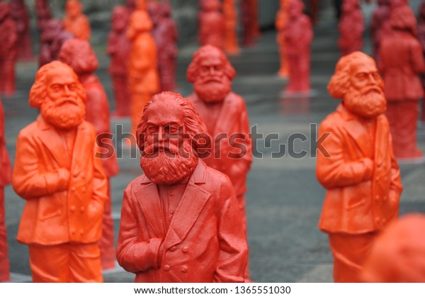 Trier, Rhineland-Palatinate / Germany - May 12,\
2013: Sculptures of Karl Marx by the artist Ottmar Hörl in Trier,\
Germany - Marx was a German philosopher, economist and political\
theorist