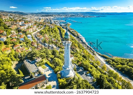 Trieste lighthouse Phare de la Victoire and cityscape panoramic aerial view, Friuli Venezia Giulia region of Italy