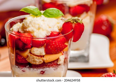 Trifle Or Cheesecake With Strawberry On Wood Table