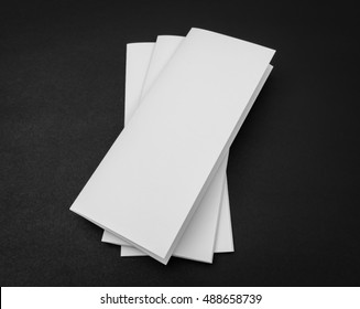 Trifold White Template Paper On Black Background