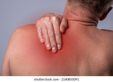 Trigger points pain. Ache in back, pressure in scapula close up. High quality photo
