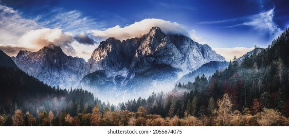 Triglav mountain peak at sunrise with beautiful clouds in morning light. Slovenia, Triglav National Park - Shutterstock ID 2055674075