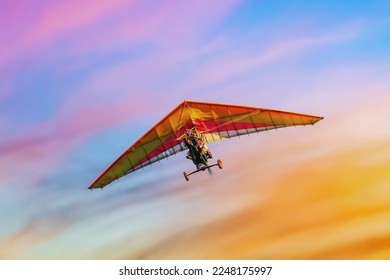 trike in flight on the background of colorful sunset sky
