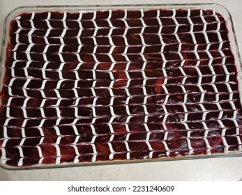 Trilece with black mulberry milk sauce - Shutterstock ID 2231240609