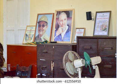 Trinidad, Cuba - January 12, 2017: Portrait Of Raul And Fidel Castro In A Government Office In Trinidad, Cuba.