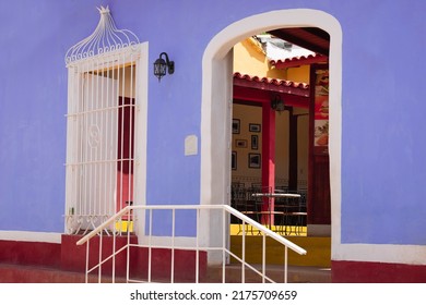 Trinidad, Cuba - July 31, 2017: Colorful Colonial Architecture. Cuban Restaurant Entrance.