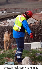 TRINO VERCELLESE, ITALY- MARCH 10: Civil Defense During Dog Handling On March, 10, 2012 In Trino Vercellese, Italy. Rescue Workers Trained Dogs To Search And Save Missing Person