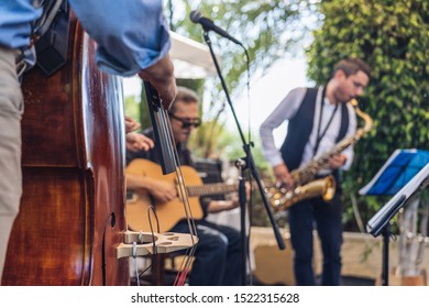 Trio Playing Jazz On Stage Outdoor 