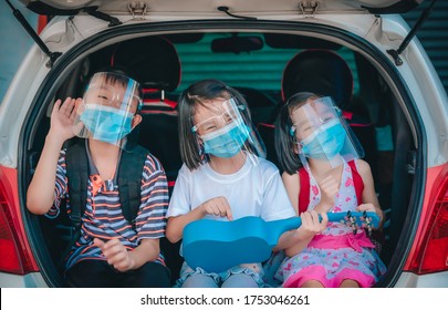 Trip Coronavirus Protect And Social Distancing Concept, Kids Playing And Singing Song On Car At Home, Funny On Outdoor Stay At Home And Wearing Mask And Face Shield For Protect Coronavirus, Child Thai